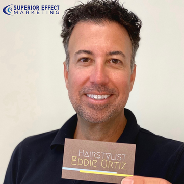Eddie Ortiz Hairstylist with business card linking to landing page